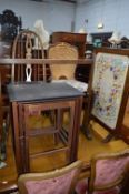 A MAHOGANY FRAMED NEEDLEWORK FIRESCREEN, an oak nest of three tables, a towel rail and two chairs (