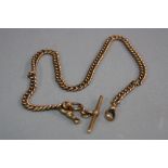 A 9CT WATCH CHAIN AND T BAR, approximate weight 36.7 grams