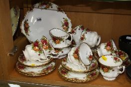 ROYAL ALBERT 'OLD COUNTRY ROSES' TEAWARES, to include cake plate, milk jug, seven cups (one