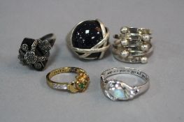 FIVE MIXED SILVER RINGS, approximate weight 32.9 grams
