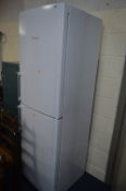 A HOTPOINT FRIDGE FREEZER, height 187cm