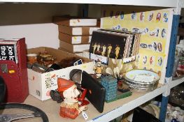 TWO BOXES AND LOOSE SUNDRY ITEMS, to include novelty money banks 'Trick Dog', 'Artillery Bank',