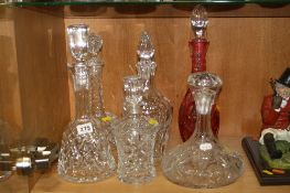 SIX CUT GLASS DECANTERS, to include Waterford, ruby flashed etc (6)