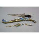 FOUR NOVELTY ITEMS, including two letter openers and two tie pins