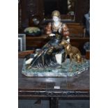 AN ART DEO STYLE FIGURE, of a seated lady with greyhound on a marble base