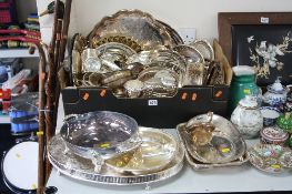 A BOX OF SILVER PLATE, to include trays, dishes, sugar hods, etc (one box and loose)