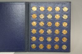 A LIMITED EDITION 1970 ENGLAND WORLD CUP COIN COLLECTION, by The Franklin Mint, thirty in bronze,