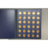 A LIMITED EDITION 1970 ENGLAND WORLD CUP COIN COLLECTION, by The Franklin Mint, thirty in bronze,