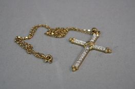 A MODERN 9CT GOLD DIAMOND SET CROSS, measuring approximately 46mmx 31mm, estimated total modern