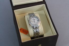 A LADIES INGERSOLL REFLECT WRISTWATCH, number 1G0609RF, (boxed)