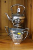 A LATE VICTORIAN SILVER PLATED SPIRIT KETTLE ON STAND, together with a plated milk and sugar (3)