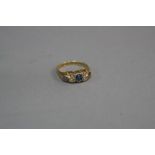 AN EARLY 20TH CENTURY 18CT GOLD SAPPHIRE AND DIAMOND DRESS RING, estimated total old swiss cut