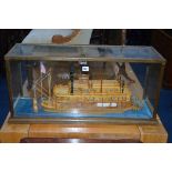 A HAND BUILT MODEL BOAT, 'King of the Mississippi' in a glazed oak case