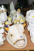 A STAFFORDSHIRE 'COW' COVERED CHEESE/BUTTER DISH (hairline to back), a 'Hen' egg basket and four