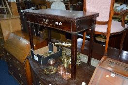 A VICTORIAN MAHOGANY FOLD OVER TEA TABLE, with single drawer (sd)