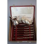 A CASED SET OF SIX SILVER HANDLED TEA KNIVES, the handles based on a circa 1460 design, Sheffield