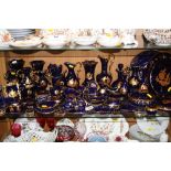 A LARGE COLLECTION LIMOGES COLBALT BLUE AND GILT TRINKETS, VASES, PLATES etc (over 50 pieces)