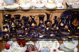 A LARGE COLLECTION LIMOGES COLBALT BLUE AND GILT TRINKETS, VASES, PLATES etc (over 50 pieces)