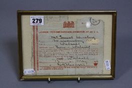 A FRAMED EARLY ROAD TAX LICENCE, 1909