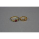 TWO EARLY 20TH CENTURY DRESS RINGS, an 18ct gold three stone diamond and synthetic ruby ring, two