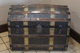 A 20TH CENTURY DOMED TOPPED TRUNK, with metal banding and embossed simulated crocodile covering