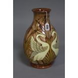 A LARGE OLD TUPTON WARE VASE, tube lined decorated with swans and foliage, approximate height 30cm