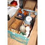A BOX OF COLLECTABLES, including ornamental eggs, treen bowls, boxed jug, clock in the form of a
