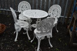 A PAINTED ALUMINIUM CIRCULAR GARDEN TABLE, and four chairs (5)