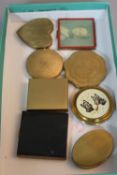 EIGHT VINTAGE COMPACTS