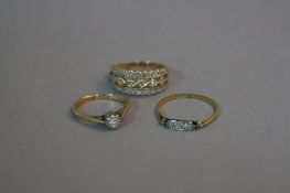 THREE DIAMOND SET RINGS, one 9ct, ring size F, two 18ct, ring sizes I & K, approximate weight 6.1