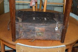 A VINTAGE LEATHER GENTLEMANS SUITCASE, bearing initials P T & Travel labels (sd)