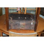 A VINTAGE LEATHER GENTLEMANS SUITCASE, bearing initials P T & Travel labels (sd)