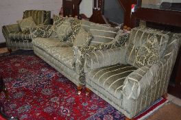 A DURESTA THREE PIECE LOUNGE SUITE, comprising a floral upholstered Knowle two seater settee and a