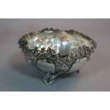 A GREEK SILVER EMBOSSED DISH, with vine leaf decoration to the top, impressed 'EPT XEIPOE',