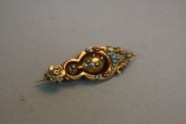 A 9CT GOLD AND TURQUOISE BROOCH, (in case)