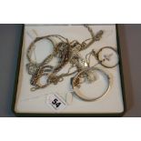 A MIXED TRAY OF SILVER JEWELLERY, approximate weight 106 grams