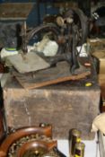 A WILCOX AND GIBBS S M CO TABLE TOP SEWING MACHINE, with a wooden box, in need of attention