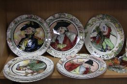 A SET OF 8 ROYAL DOULTON SERIES WARE PLATES, to include 'The Jester' D6277, 'The Huntsman' D6282, '