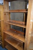 A TALL PINE OPEN BOOKCASE