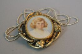 A VICTORIAN GOLD PORTRAIT MINIATURE BROOCH, together with a string of pearls (2)