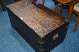 A STAINED HARDWOOD TRUNK, with metal banding