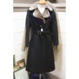 A HUCKE LADIES WOOL LONG COAT, with fur trim, size 40 and a gentleman's Morlands sheepskin coat,