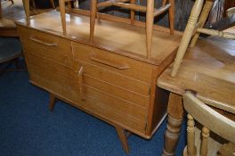 E. GOMME TEAK SIDEBOARD, with two drawers, approximate size width 125cm x height 86cm x depth 42cm