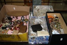 FOUR BOXES OF MIXED COSTUME JEWELLERY, including bagged cufflinks and earrings, etc