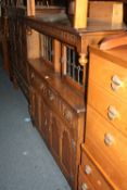 AN OLD CHARM OAK COURT CUPBOARD ABOVE TWO LONG DRAWERS