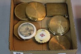 EIGHT VINTAGE COMPACTS