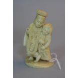 A VICTORIAN IVORY FIGURE, approximate height 10cm