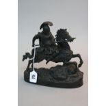 A 19TH CENTURY BRONZE OF A ROMAN WARRIOR ON HORSEBACK, bears signature Alexandre to rocks beneath