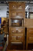 A PAIR OF HARDWOOD TWO DRAWER BEDSIDE CABINETS
