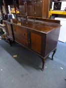 A MAHOGANY SIDEBOARD, with two central drawers (sd)
